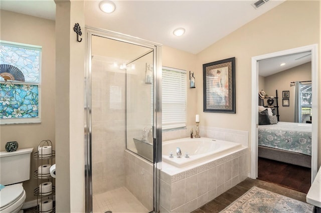 bathroom with vaulted ceiling, toilet, independent shower and bath, and hardwood / wood-style floors