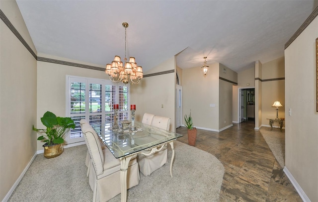 dining space with lofted ceiling, a chandelier, and carpet