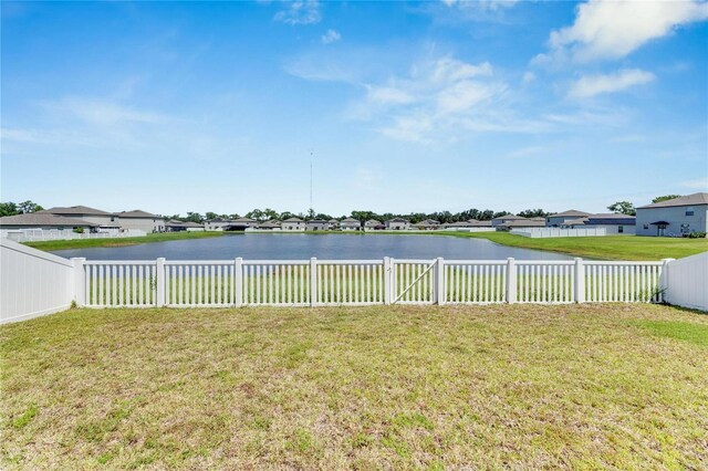 view of yard with a water view