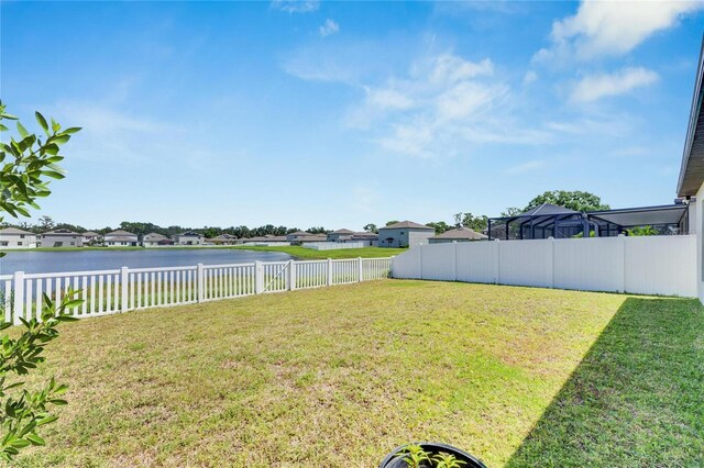 view of yard with a water view