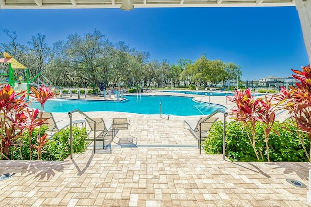 view of pool with a patio area