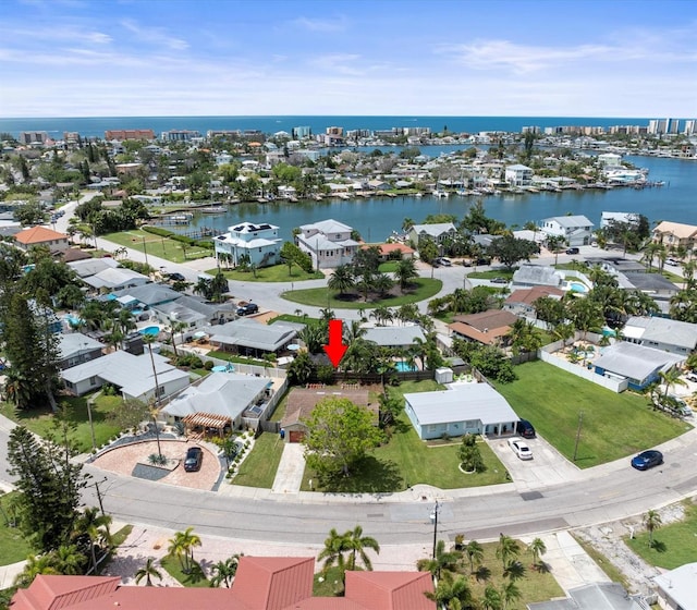 birds eye view of property featuring a water view