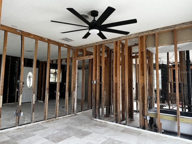 misc room with ceiling fan