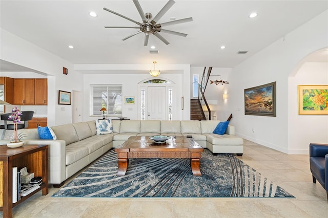 living room featuring ceiling fan