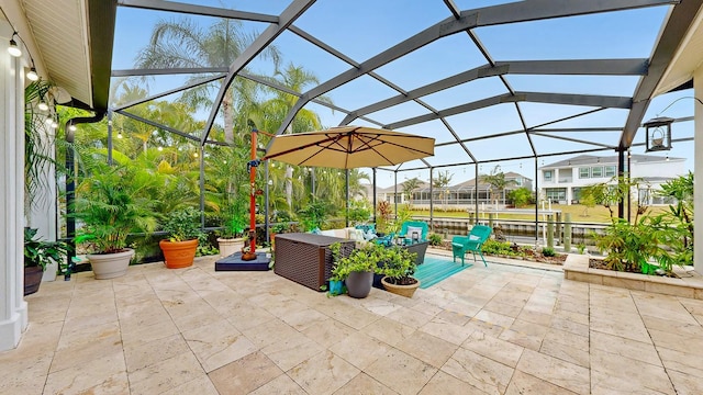 view of patio with a lanai