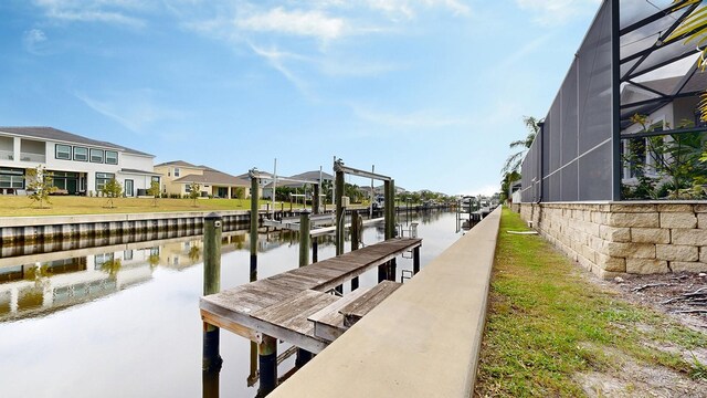 view of dock featuring a water view and glass enclosure