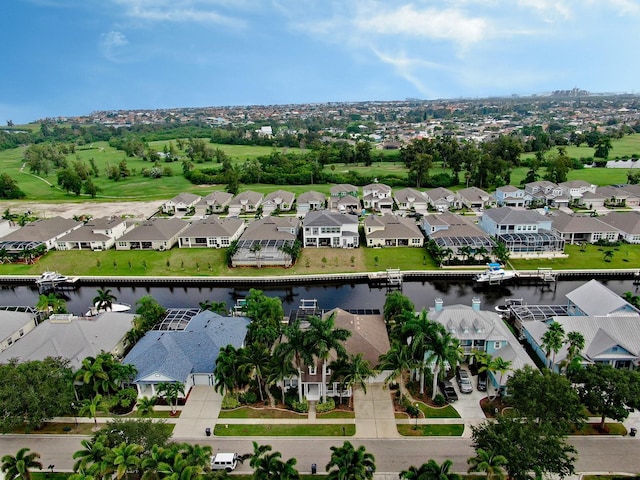 bird's eye view with a water view