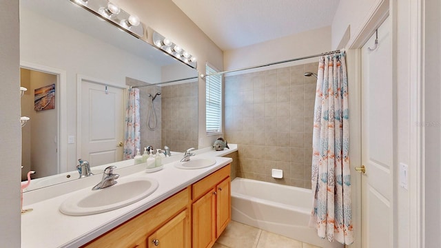 bathroom with tile patterned flooring, shower / tub combo with curtain, and double vanity