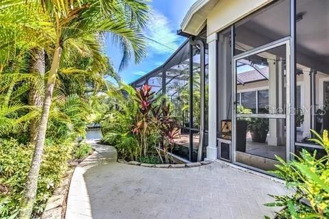 property entrance featuring a patio