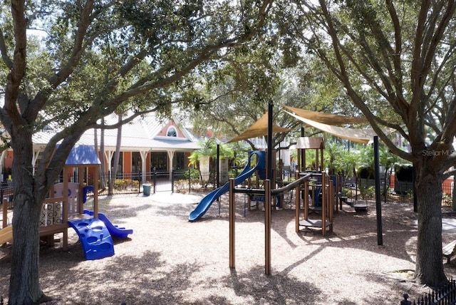 communal playground featuring fence