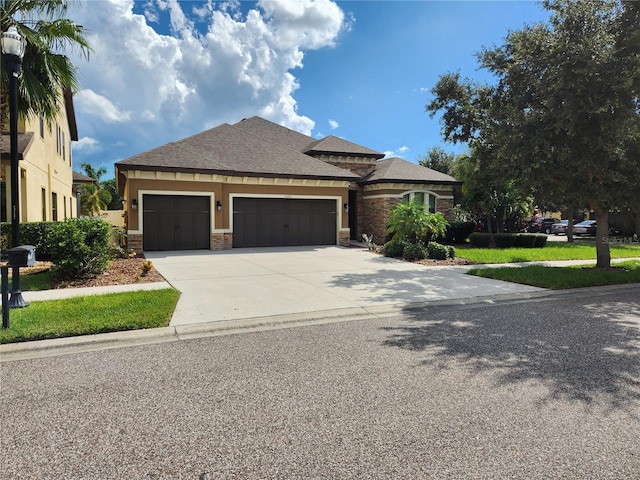 prairie-style house featuring a garage