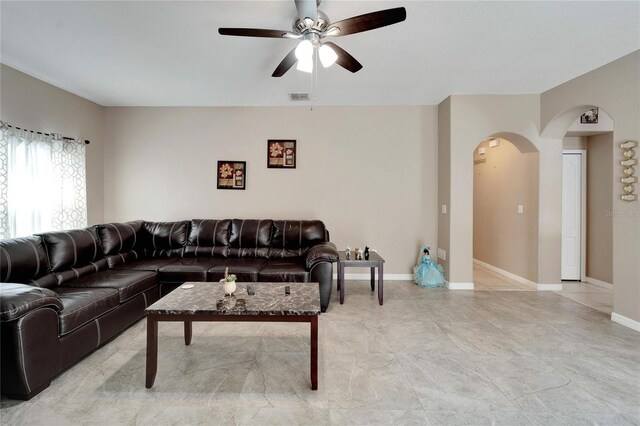 living room featuring ceiling fan