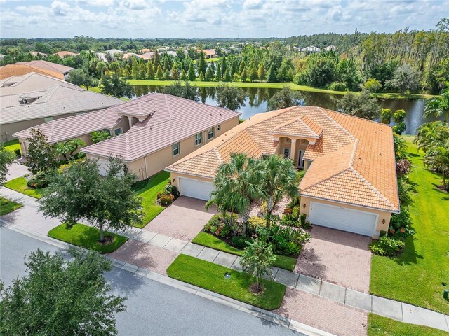 bird's eye view with a water view