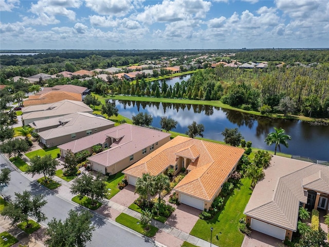 aerial view featuring a residential view and a water view