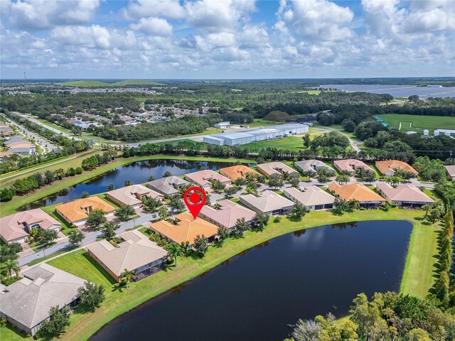 aerial view with a water view and a residential view