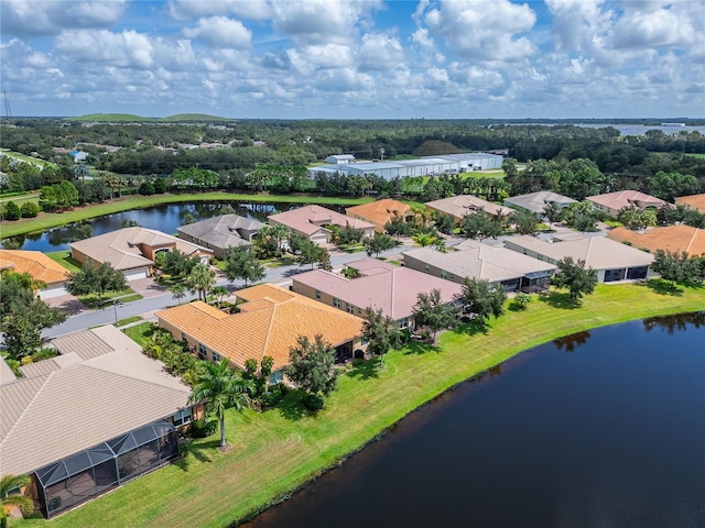 bird's eye view with a residential view and a water view