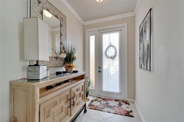 entrance foyer with baseboards, crown molding, and light tile patterned flooring