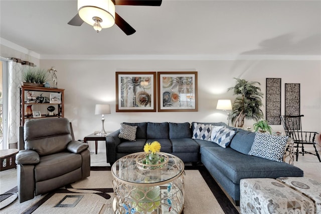 carpeted living room with plenty of natural light and ceiling fan