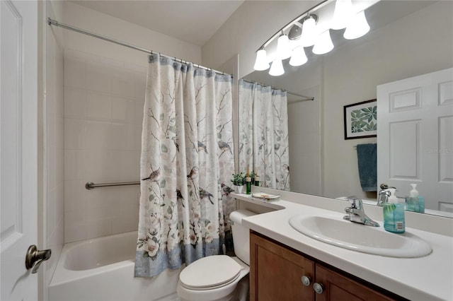 full bathroom featuring vanity, toilet, and shower / tub combo