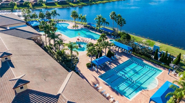 drone / aerial view with a water view