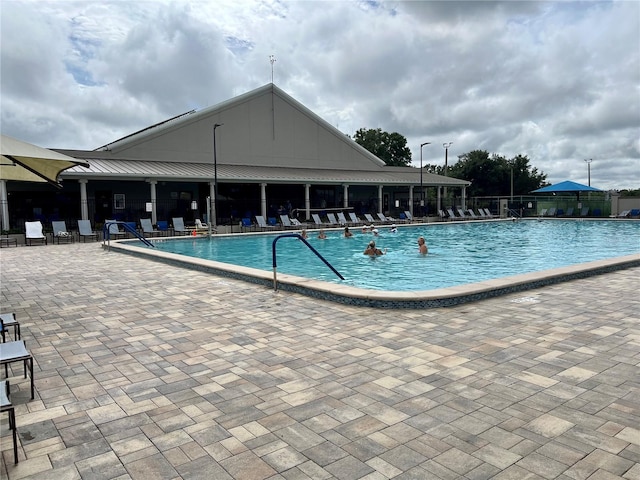 view of pool with a patio area