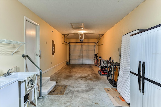 garage with electric panel and a garage door opener