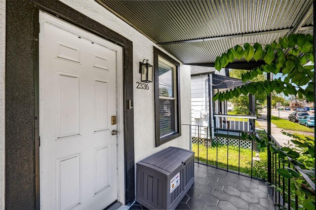 entrance to property with a porch