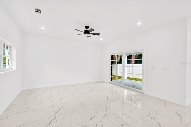 unfurnished room with ceiling fan