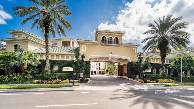 view of building exterior with driveway