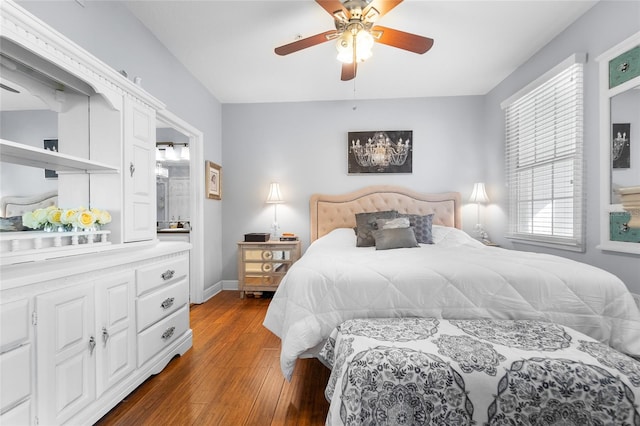 bedroom featuring hardwood / wood-style flooring and ceiling fan