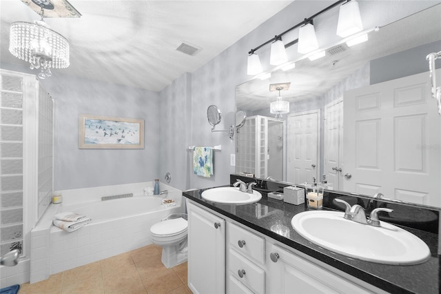 full bathroom with vanity, toilet, plus walk in shower, and tile patterned flooring