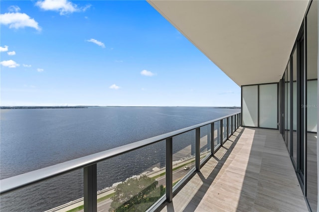 balcony featuring a water view