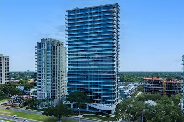 view of property with a city view