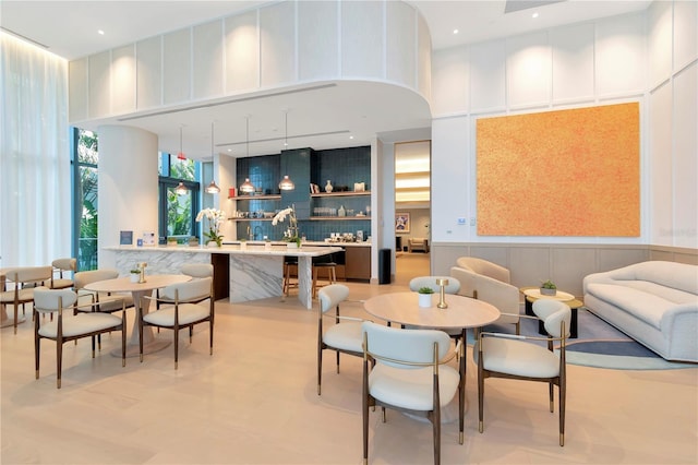 2912 Santiago St Unit 1201, Tampa, FL 33629 - common area with a high ceiling, a wainscoted wall, and a decorative wall