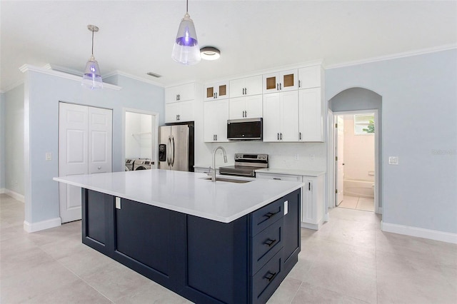 kitchen with pendant lighting, white cabinetry, stainless steel appliances, and sink