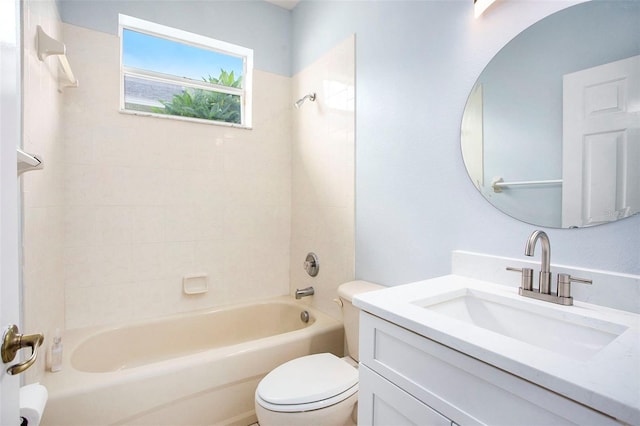 bathroom featuring toilet, bathtub / shower combination, and vanity