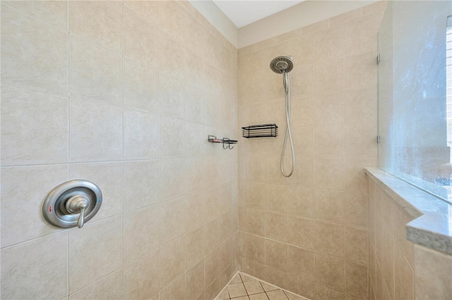 bathroom featuring tiled shower