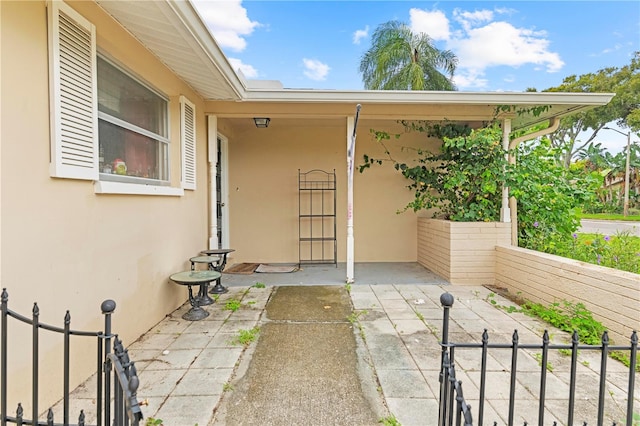 doorway to property featuring a patio area