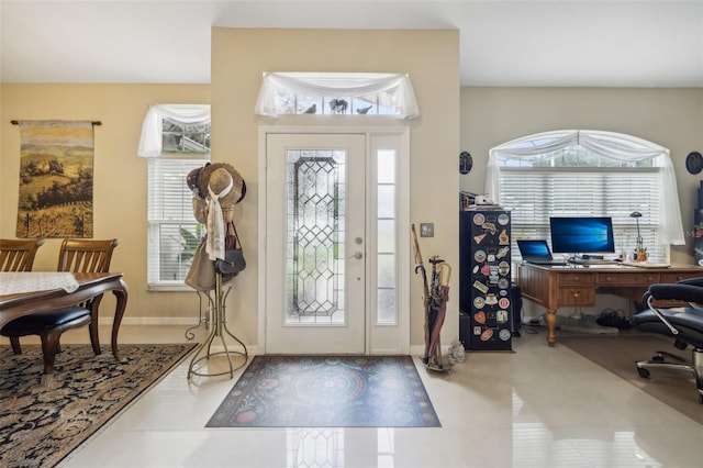 entrance foyer with light tile patterned flooring