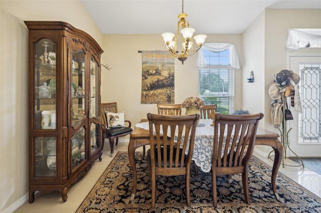 dining room with a notable chandelier