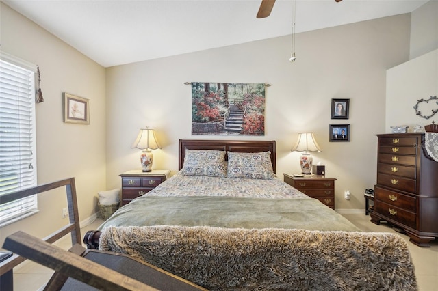 bedroom featuring light carpet, vaulted ceiling, and ceiling fan