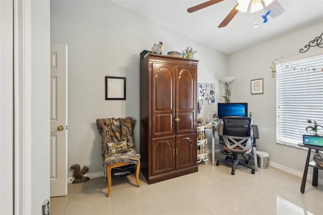 office area with ceiling fan and light tile patterned floors