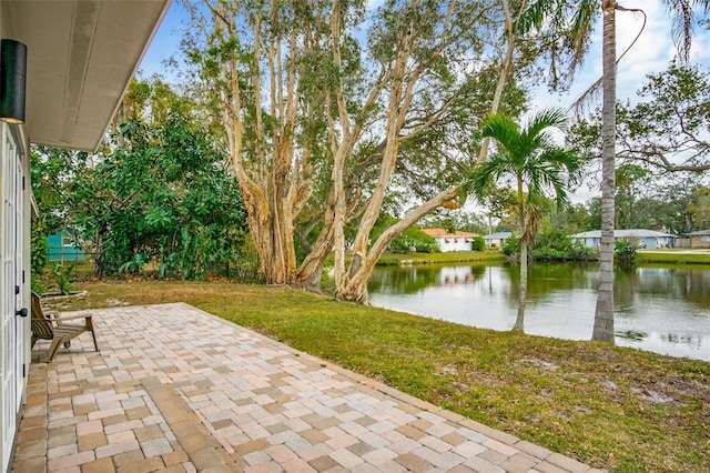 view of patio / terrace featuring a water view