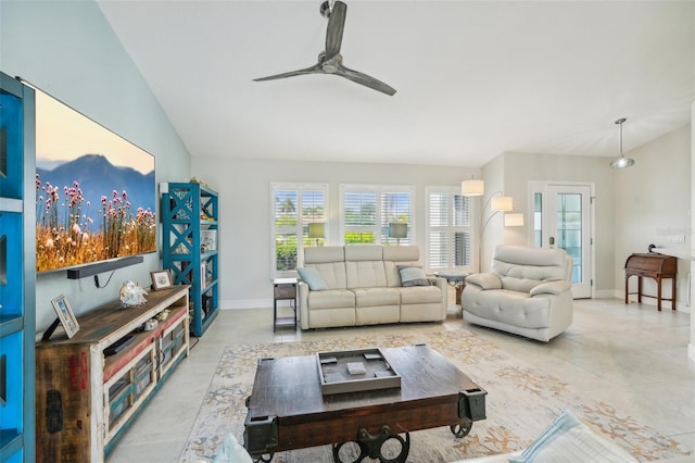 living room with lofted ceiling and ceiling fan