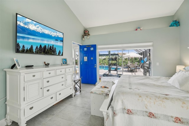 tiled bedroom with lofted ceiling and access to outside