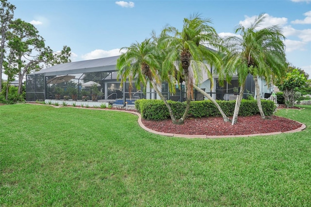 view of yard featuring a lanai