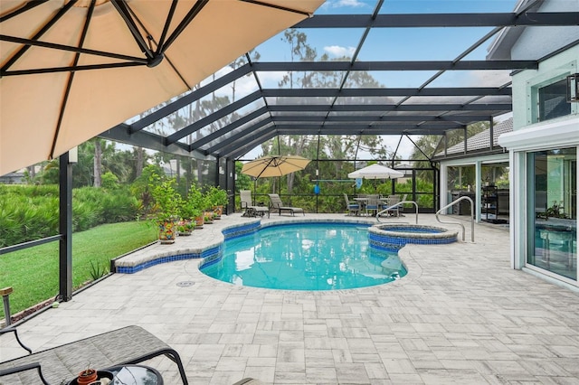 view of swimming pool featuring a patio, glass enclosure, and an in ground hot tub