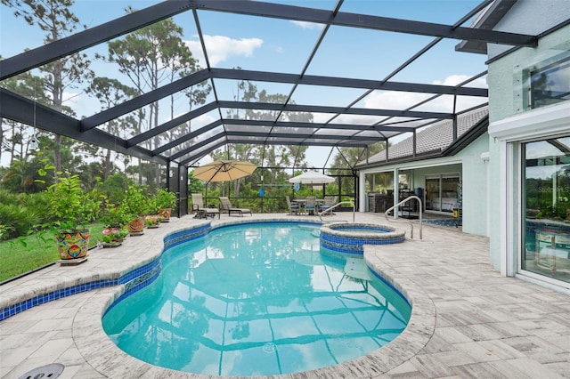 view of pool featuring a lanai, a patio, and an in ground hot tub