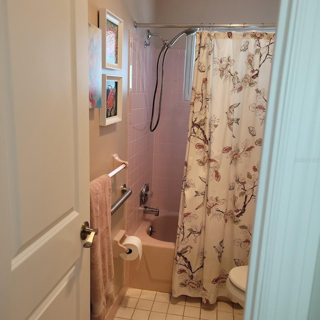 full bath featuring toilet, shower / bath combination with curtain, and tile patterned floors