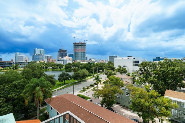 property's view of city with a water view